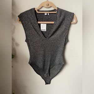 Size small urban outfitters bodysuit, multicolored. Never worn.